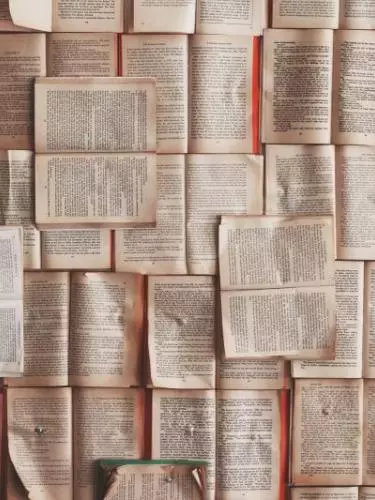 Books open on a table