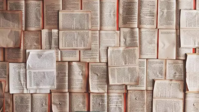 Books open on a table