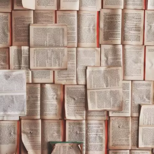 Books open on a table