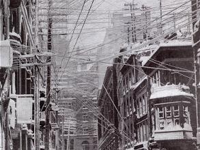 Telephone, telegraph, and power lines over the streets of New York City, 1888. Source: Wikimedia Commons