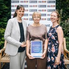 Photograph of Sally Shuttleworth accepting the award